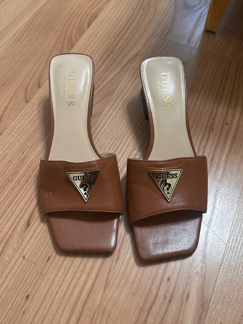 GUESS Brown Slide Mules with Gold Triangle Logo